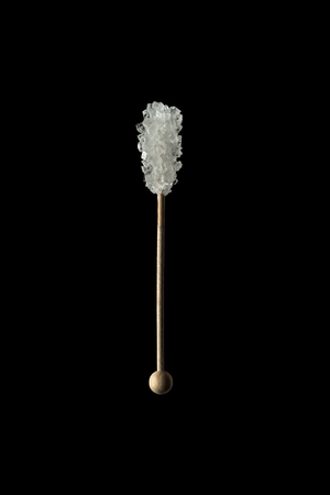 caramel candy sugar on a stickの写真素材
