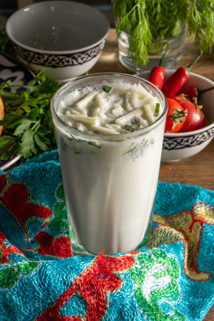 Ayran. Fermented milk drink based on turakh, katyk or kefir with the addition of cucumbers and herbs
