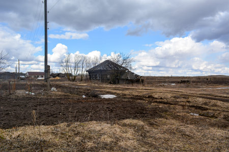 Sometimes villages are abandoned and destroyed wooden housesの写真素材