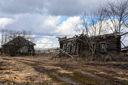 Sometimes villages are abandoned and destroyed wooden housesの写真素材