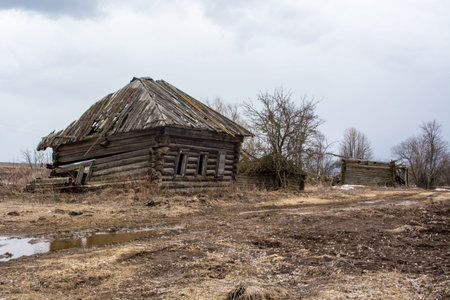 Sometimes villages are abandoned and destroyed wooden housesの写真素材