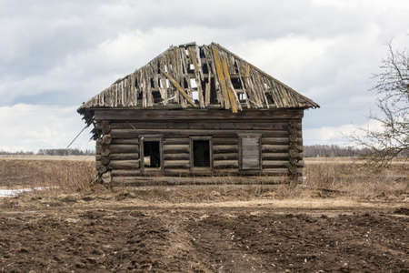 Sometimes villages are abandoned and destroyed wooden housesの写真素材