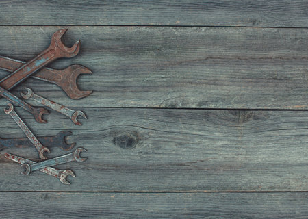 In the old, wooden, cracked, the working surface in the workshop lie in the left corner of the...
