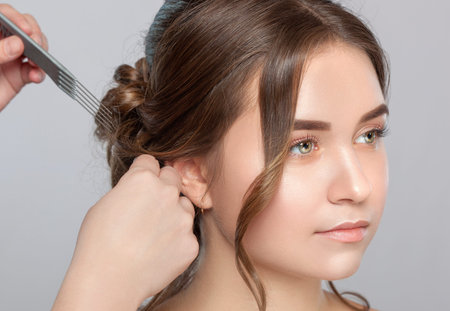 Portrait of a beautiful happy woman with beautiful fresh make-up and with clean skin, with a wedding...