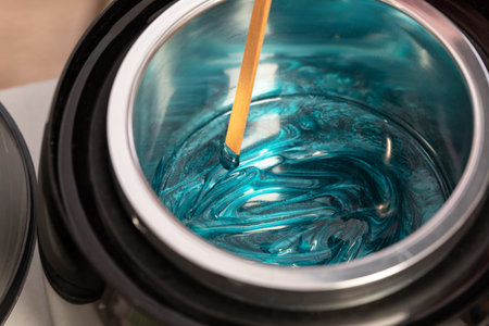 Melted wax for removing facial hair close-up. Permanent Make-up on her Eyebrows. Professional makeup.の写真素材