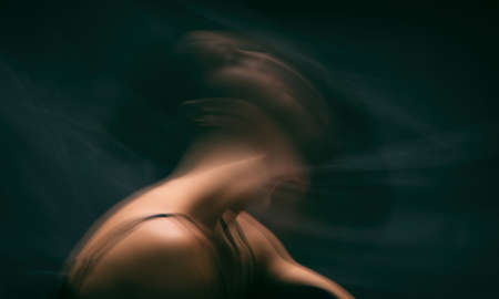 photo of a woman, double exposure. Bipolar brain disorder and mental health functionの写真素材