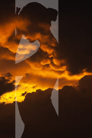 Silhouette of a girl in the sunset clouds. abstraction. The wealth of the inner world of man.