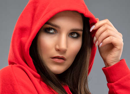 Portrait of attractive girl with healthy clean skin and beautiful make-up. Aesthetic cosmetology and makeup concept.の写真素材