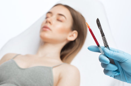 Anti-aging injections against facial wrinkles or plastic surgery. Women's aesthetic cosmetology in a beauty salon.Anti-aging injections against facial wrinkles or plastic surgery. Women's aesthetic cosmetology in a beauty salon.の写真素材