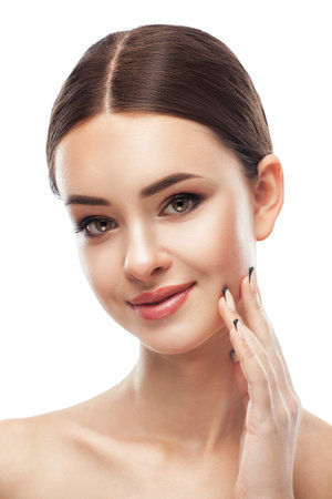 Portrait of attractive girl with healthy clean skin and beautiful make-up. Aesthetic cosmetology and makeup concept.の写真素材