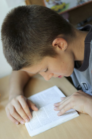 Boy reading a book
