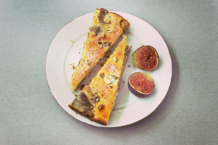 Fresh and tasty cake with fresh figs on a plateの写真素材