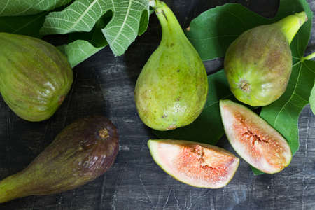 Ripe of fresh figs on the wooden tableの写真素材