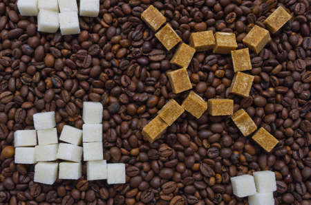 Funny composition of sugar in the form of a sun and cloudsの写真素材