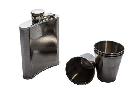 A flask and a stack of stainless steelの写真素材