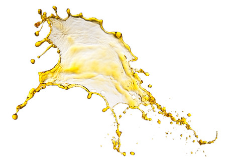 Flying splash yellow liquid on a white backgroundの写真素材