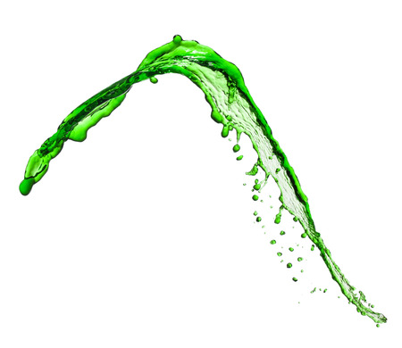flying spray green liquid on white backgroundの写真素材