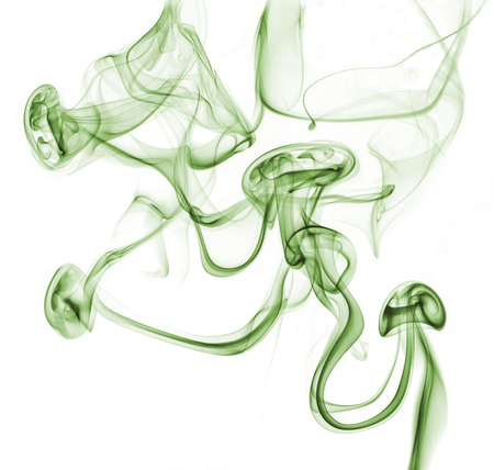 abstract green smoke isolated on white backgroundの写真素材