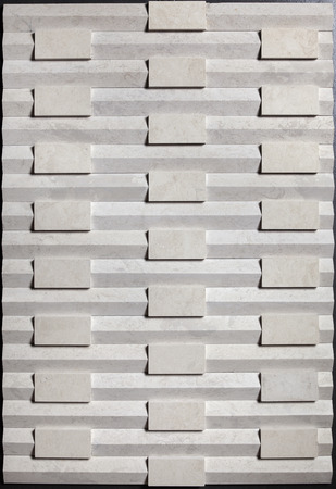 decorative stone wall with relief itemsの写真素材