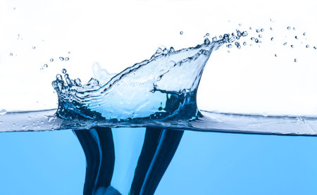 Fresh clean water splash in blue.の写真素材