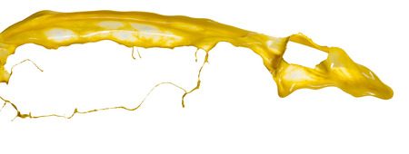 yellow paint splashes isolated on white backgroundの写真素材