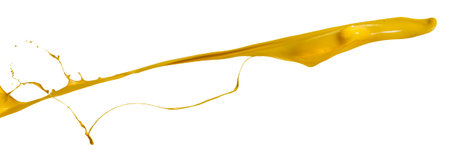 splashes of yellow paint isolated on white backgroundの写真素材