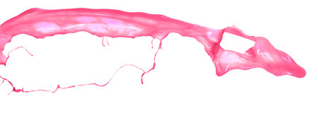 Pink paint splashing isolated on white backgroundの写真素材