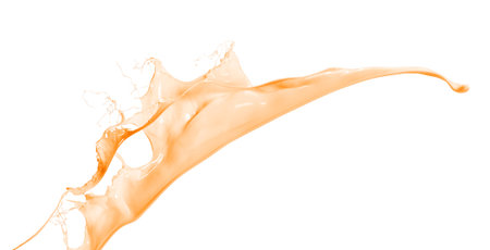 Isolated shot of orange paint splash on white backgroundの写真素材