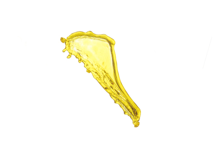 flying beautiful engine oil isolated over white backgroundの写真素材