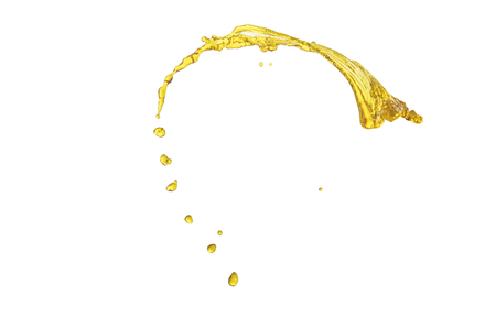 flying beautiful oil splah isolated over white background and dropsの写真素材