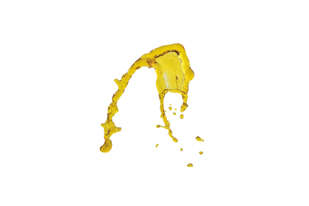 flying beautiful oil splah isolated over white background and dropsの写真素材