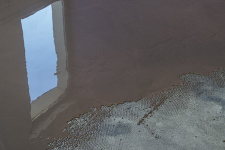 Floor covering with self leveling plaster. Mirror smooth surface of the floorの写真素材