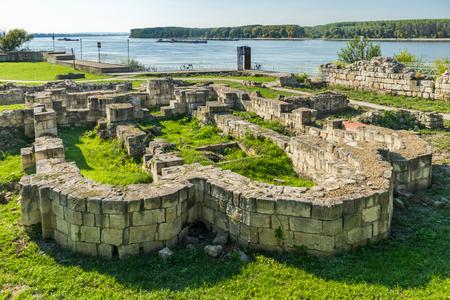Remains of stone walls of ancient castle Durostorum on the Danube river, Bulgariaの写真素材