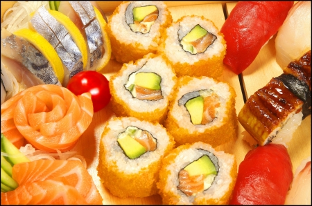 The californian maki in a boat with sushi and sashimi の写真素材