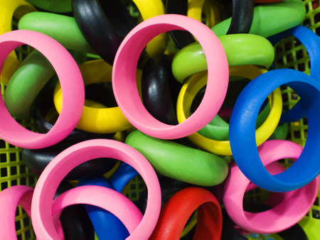 trendy colorful wooden bracelets closeupの写真素材