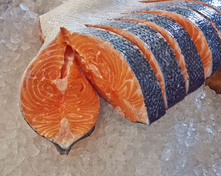 fresh salmon cut for sale at the central marketの写真素材