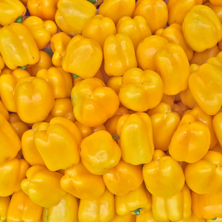 colorful yellow bell peppers for sale, natural background