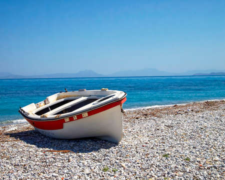Corinthian gulf Greece, small boat on the beachの写真素材