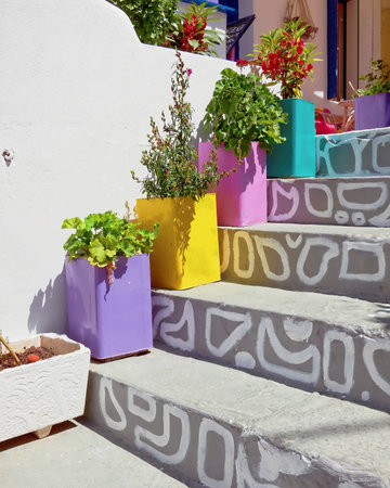 Milos island, Greece, colorful flower canistersの写真素材