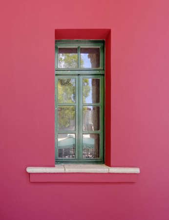 colorful building detail, green window, red wallの写真素材