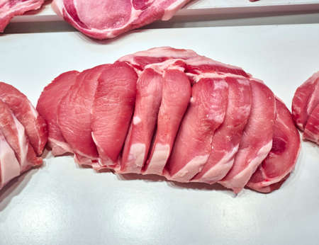 fresh sliced raw meat closeupの写真素材