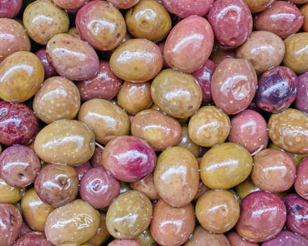 organic variety of olives close up, tasty backgroundの写真素材