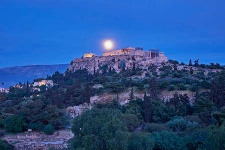 Athens Greece, acropolis in the twilight under full moonの写真素材