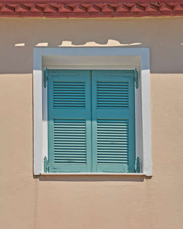 Athens Greece, green shutters window in Plaka old neighborhoodの写真素材