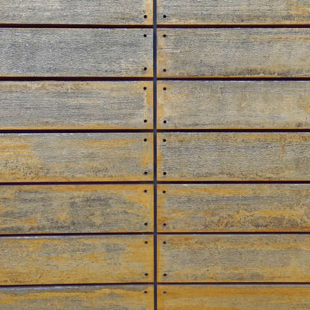 weathered wood stripes closeup backgroundの写真素材
