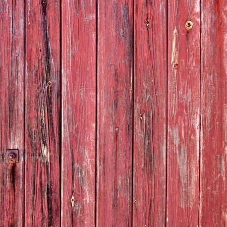 red painted weathered wood stripes closeupの写真素材