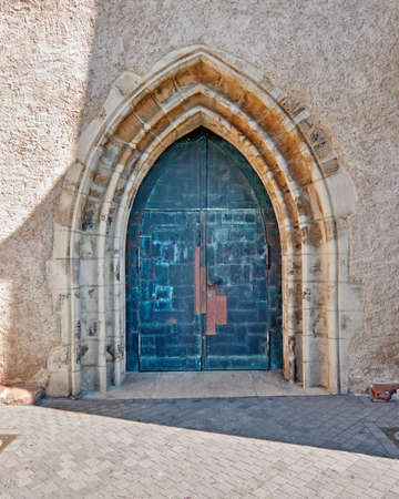 gothic arched church entrance doorの写真素材