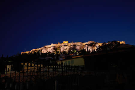 Night in Athens Greece, Acropolis hill over Plaka picturesque neighborhoodの写真素材