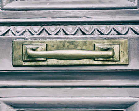 elegant house gray door with bronze handleの写真素材