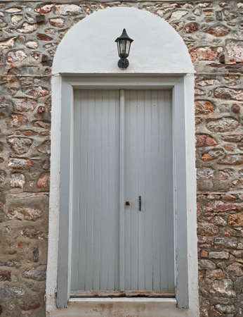 Greece, Hydra island, old house arched doorの写真素材